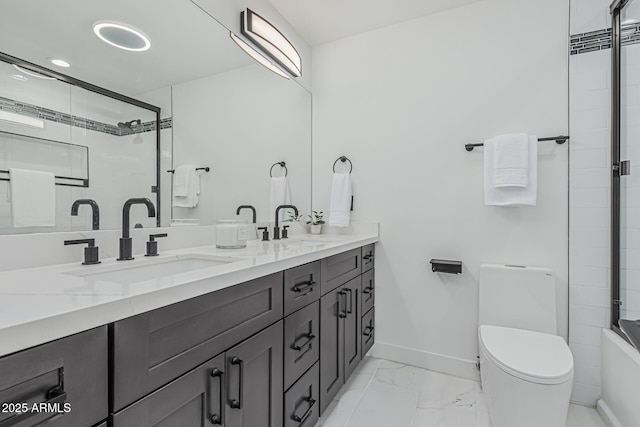 8522 E Virginia Ave, Scottsdale, AZ 85257 - bathroom with marble look tiles, double vanity, baseboards, and toilet