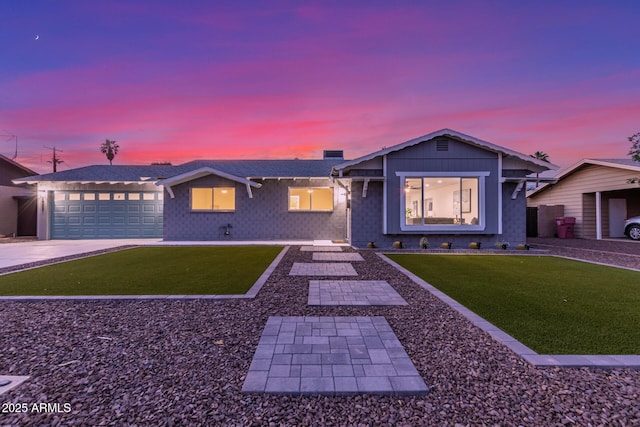 8522 E Virginia Ave, Scottsdale, AZ 85257 - ranch-style home with a lawn, a garage, and concrete driveway