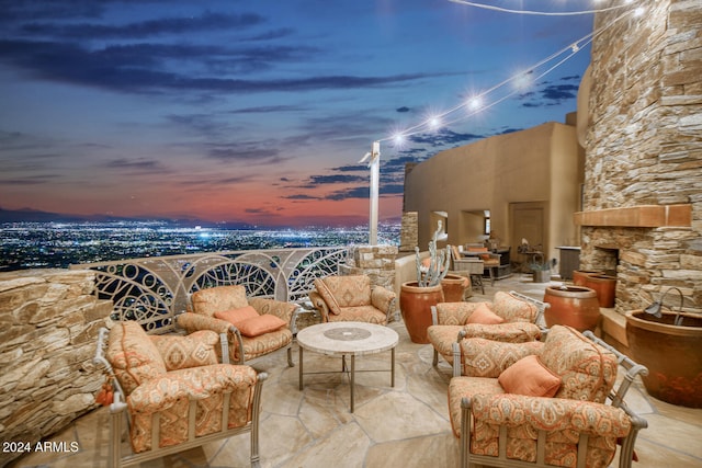 patio terrace at dusk with outdoor lounge area