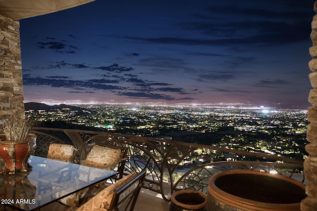 view of balcony at dusk