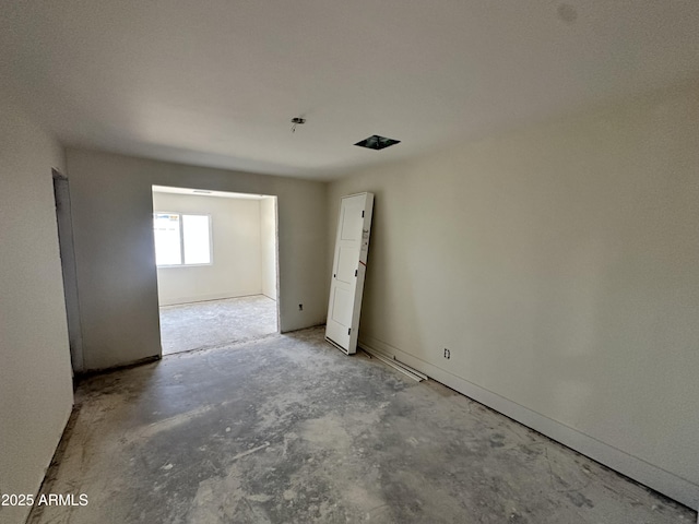 3725 E Karen Dr, Phoenix, AZ 85032 - spare room featuring concrete floors
