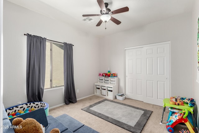 playroom with visible vents, ceiling fan, baseboards, and carpet