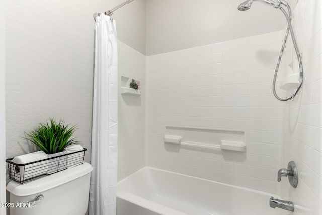 full bathroom featuring toilet and shower / bath combo