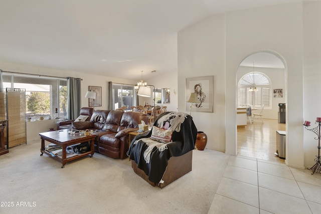 tiled living room with vaulted ceiling