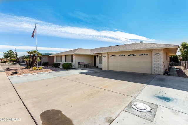 single story home featuring a garage