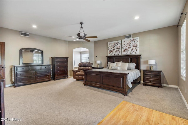 carpeted bedroom featuring ceiling fan