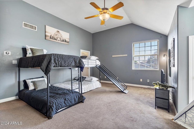 carpeted bedroom featuring ceiling fan and vaulted ceiling