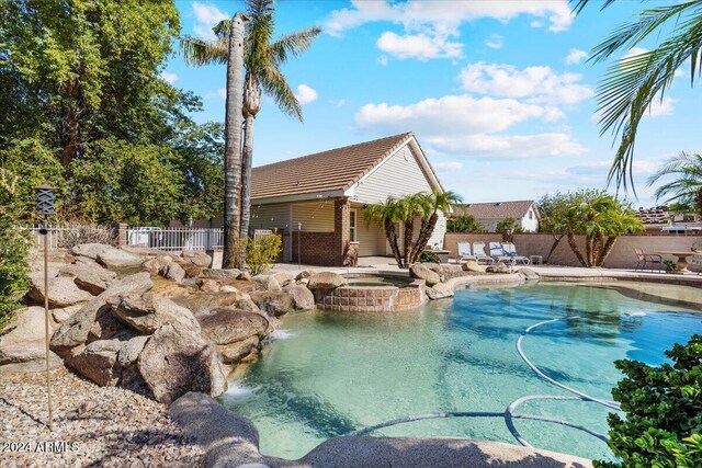 view of swimming pool featuring a patio