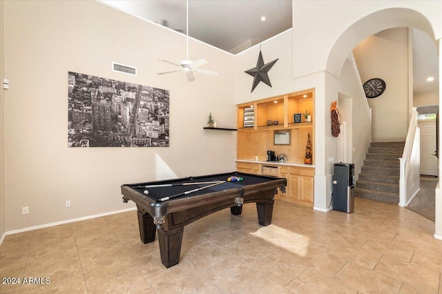 recreation room featuring high vaulted ceiling, ceiling fan, and billiards