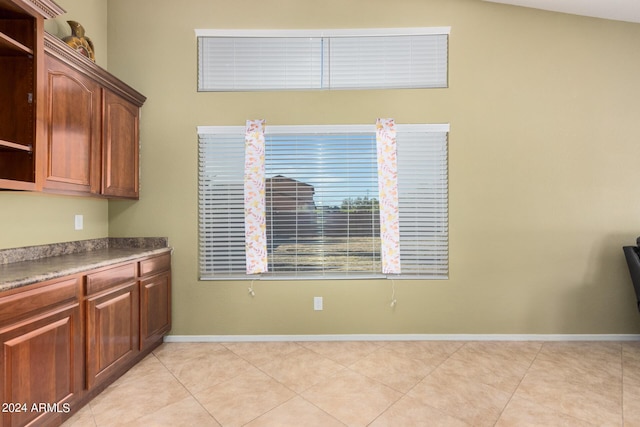 kitchen featuring light tile patterned flooring