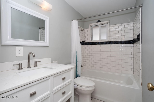 full bathroom featuring vanity, shower / tub combo with curtain, and toilet