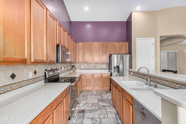 8809 S 21st St, Phoenix, AZ 85042 - kitchen with light countertops, tasteful backsplash, appliances with stainless steel finishes, and a sink