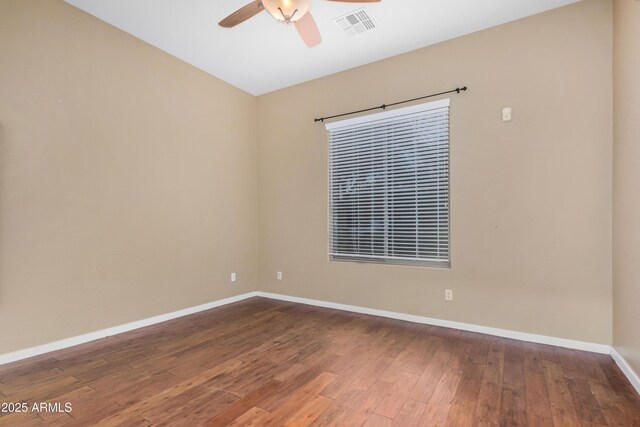 8809 S 21st St, Phoenix, AZ 85042 - spare room featuring hardwood / wood-style floors, ceiling fan, baseboards, and visible vents