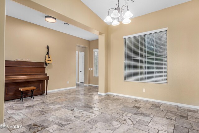 8809 S 21st St, Phoenix, AZ 85042 - interior space with stone tile floors, an inviting chandelier, baseboards, and visible vents