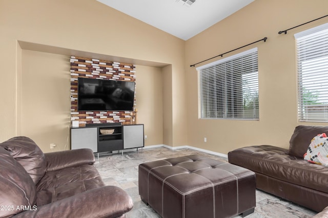 8809 S 21st St, Phoenix, AZ 85042 - living area with marble finish floor, visible vents, baseboards, and lofted ceiling