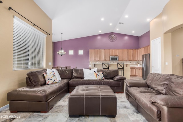 8809 S 21st St, Phoenix, AZ 85042 - living room featuring a chandelier, high vaulted ceiling, and visible vents