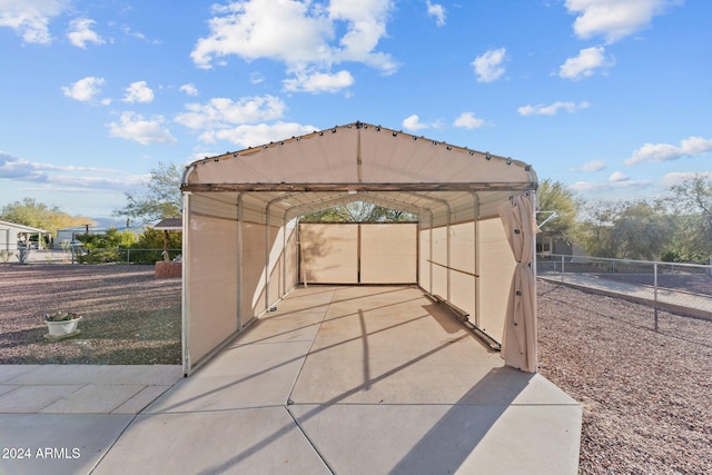 view of patio / terrace featuring a carport