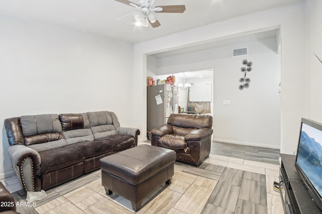 2223 E Roosevelt St, Phoenix, AZ 85006 - living area featuring ceiling fan and visible vents