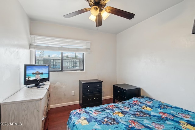 2223 E Roosevelt St, Phoenix, AZ 85006 - bedroom featuring baseboards, dark wood finished floors, and a ceiling fan