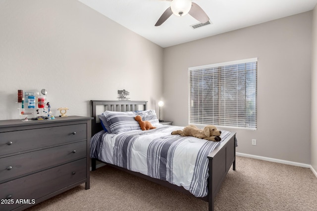 bedroom with ceiling fan and light colored carpet