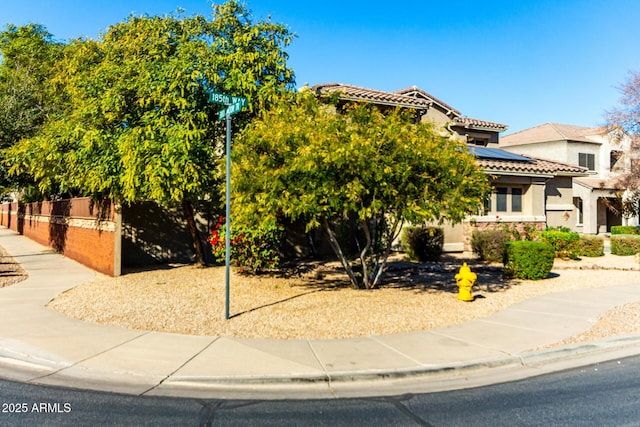 view of front of home with solar panels