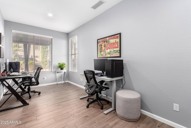 office area with hardwood / wood-style floors