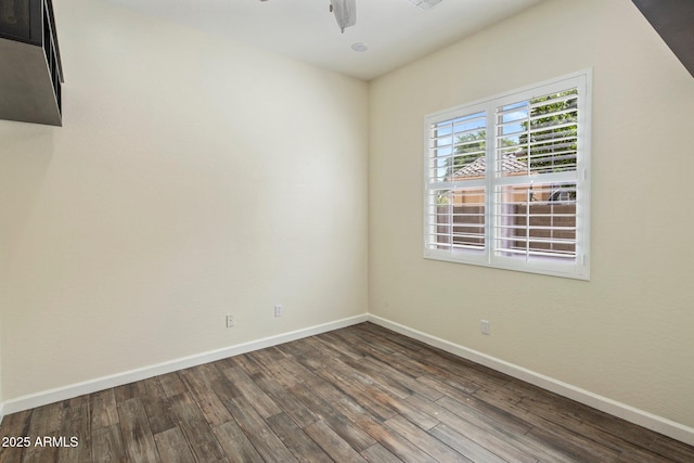 654 E County Down Dr, Chandler, AZ 85249 - empty room featuring dark wood finished floors, baseboards, and ceiling fan