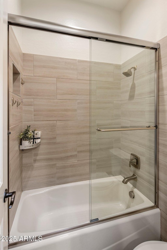 654 E County Down Dr, Chandler, AZ 85249 - bathroom featuring combined bath / shower with glass door and toilet