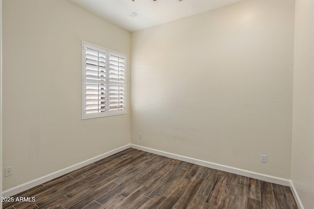 654 E County Down Dr, Chandler, AZ 85249 - empty room with dark wood finished floors and baseboards