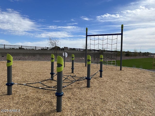 view of property's community featuring playground community