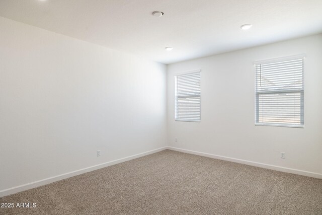 17778 W Turquoise Ave, Waddell, AZ 85355 - unfurnished room featuring carpet flooring and baseboards