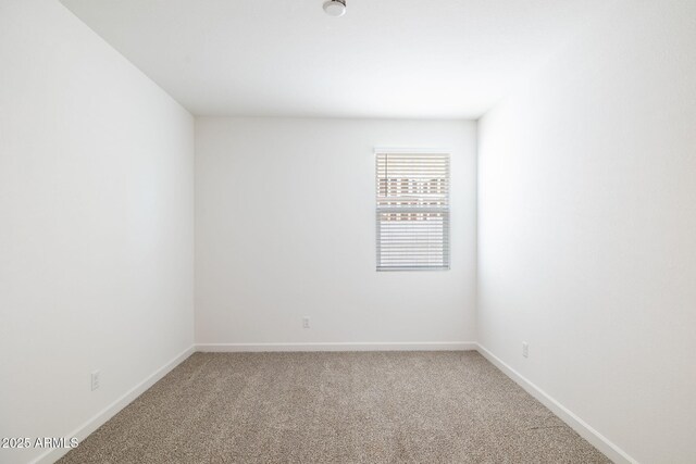 17778 W Turquoise Ave, Waddell, AZ 85355 - unfurnished room featuring carpet floors and baseboards
