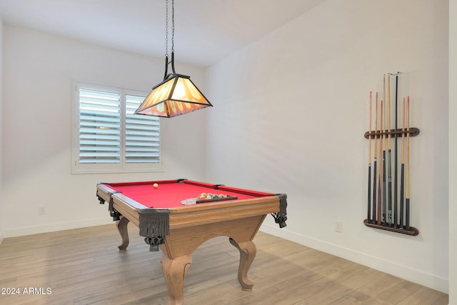 recreation room with hardwood / wood-style floors and pool table