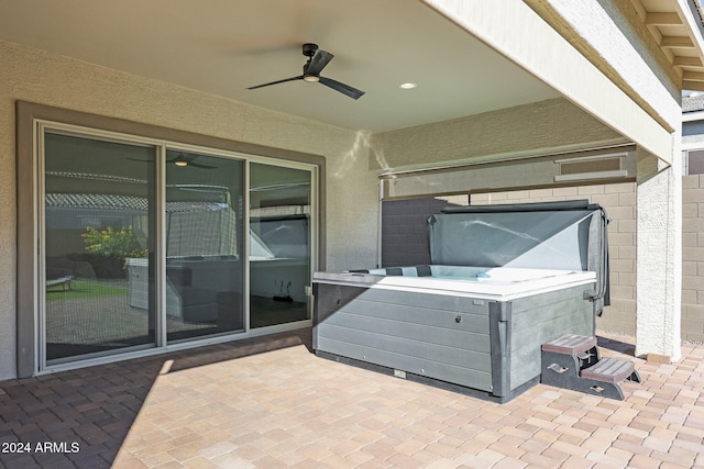 view of patio / terrace featuring ceiling fan