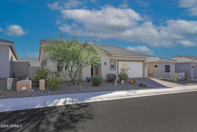 view of front of property featuring a garage