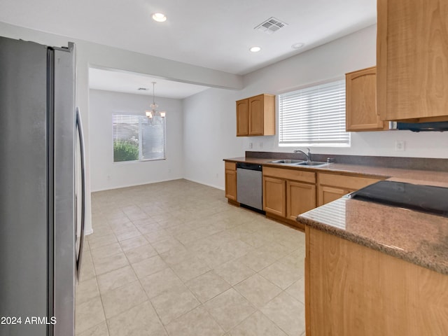 11168 E Lost Canyon Ct, Gold Canyon, AZ 85118 - kitchen with sink, hanging light fixtures, a healthy amount of sunlight, and appliances with stainless steel finishes
