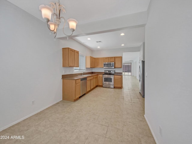 11168 E Lost Canyon Ct, Gold Canyon, AZ 85118 - kitchen featuring light brown cabinetry, sink, a chandelier, hanging light fixtures, and stainless steel appliances
