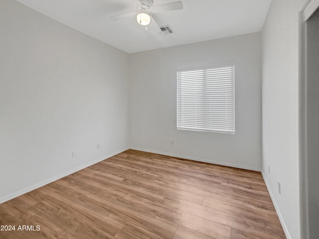 11168 E Lost Canyon Ct, Gold Canyon, AZ 85118 - unfurnished room featuring light hardwood / wood-style floors and ceiling fan