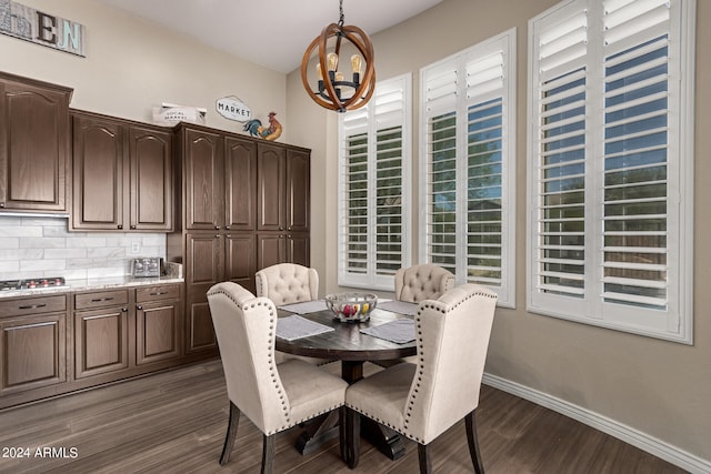 dining room with dark wood-type flooring