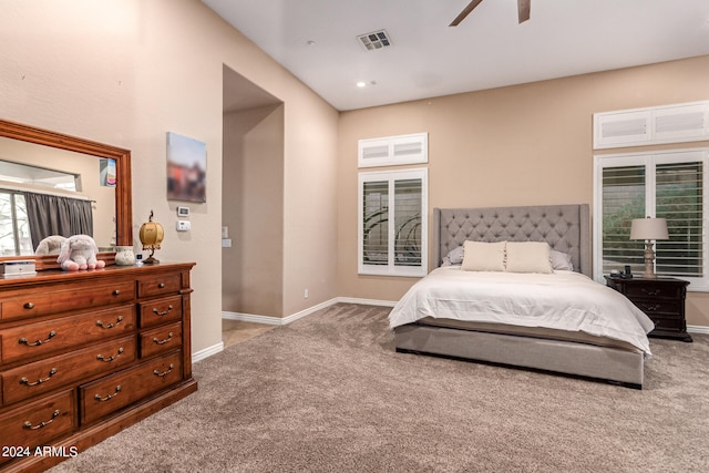 carpeted bedroom featuring ceiling fan