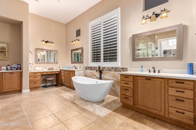 bathroom with plus walk in shower, tile patterned flooring, and vanity