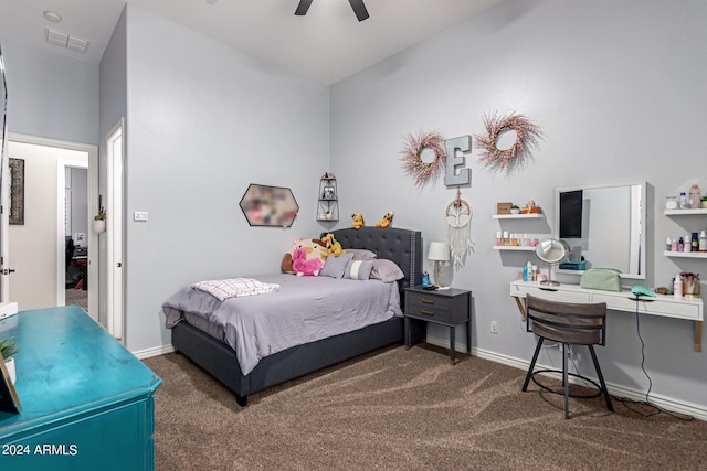 carpeted bedroom featuring ceiling fan and lofted ceiling