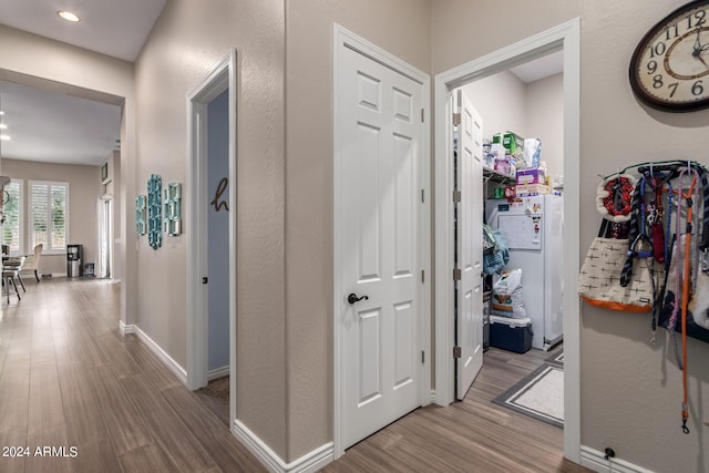 hallway featuring light hardwood / wood-style floors