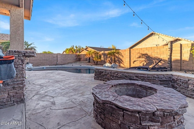 view of patio featuring a fenced in pool