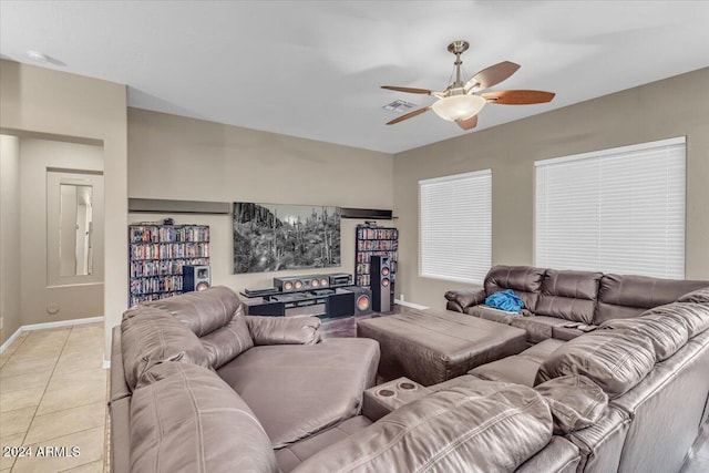 tiled living room featuring ceiling fan