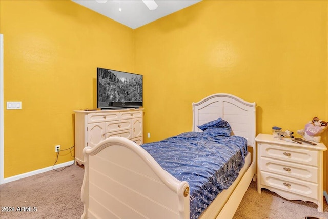 bedroom with ceiling fan and light colored carpet