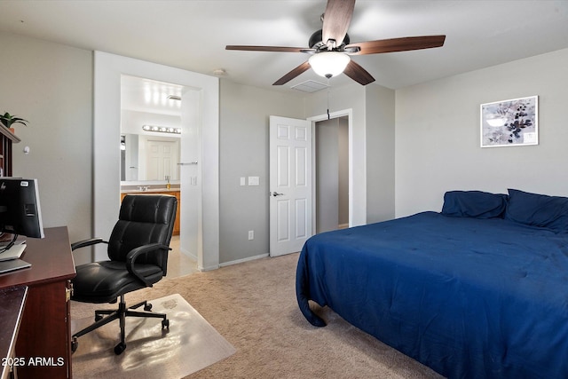 17802 N 114th Ln, Surprise, AZ 85378 - bedroom with light carpet, a desk, connected bathroom, and ceiling fan