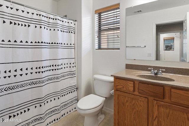 17802 N 114th Ln, Surprise, AZ 85378 - full bath featuring toilet, vanity, tile patterned floors, and a shower with shower curtain