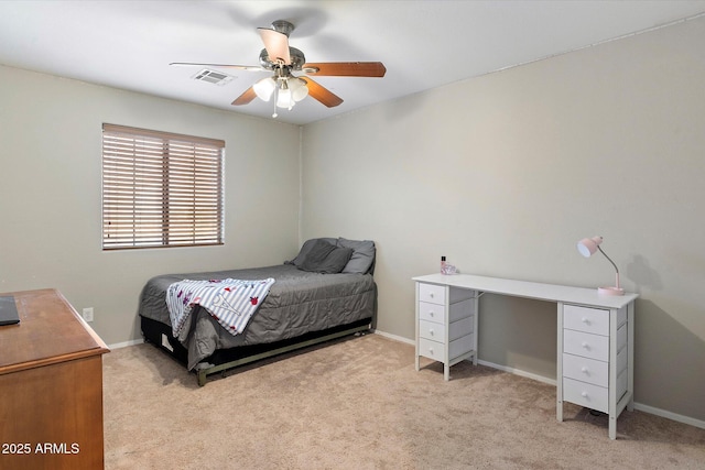 17802 N 114th Ln, Surprise, AZ 85378 - bedroom with light colored carpet, a ceiling fan, and baseboards