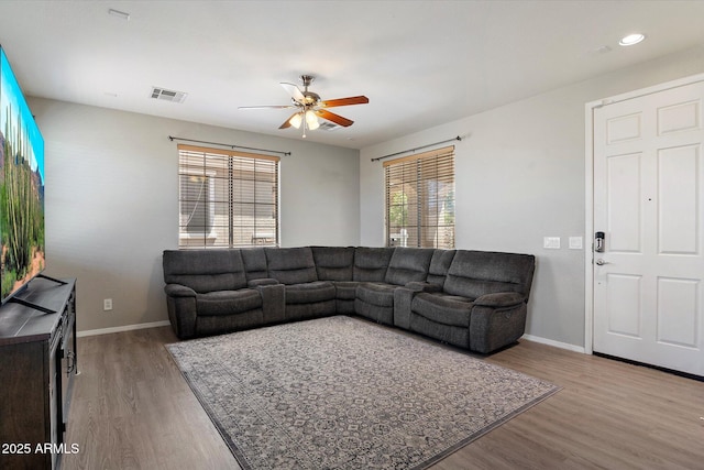 17802 N 114th Ln, Surprise, AZ 85378 - living room with ceiling fan, wood finished floors, baseboards, and recessed lighting